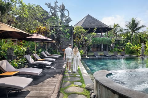 Outdoor pool, open 7:00 AM to 7:00 PM, pool umbrellas, sun loungers