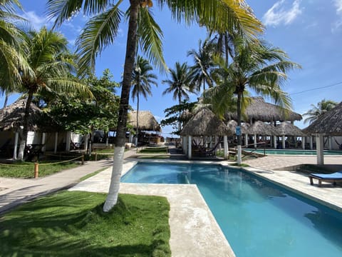 2 outdoor pools, open 7:00 AM to 10:00 PM, free cabanas