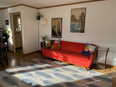 Enter the home into the sunny and bright living room and dining room.