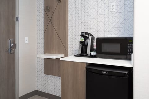 Hypo-allergenic bedding, desk, blackout drapes, iron/ironing board