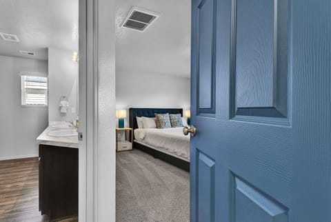 Teal King Primary Bedroom and Bathroom