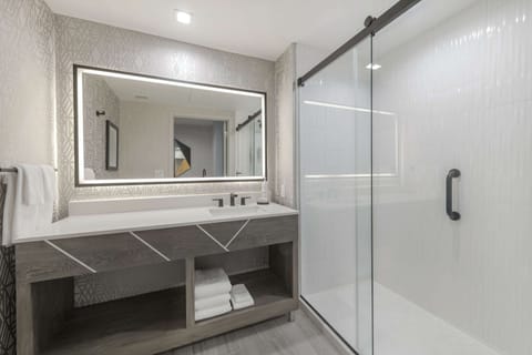 Suite, 1 King Bed (Hearing) | Bathroom shower