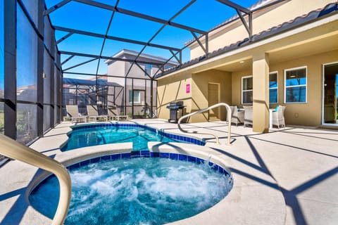 Amazing private pool of the home in Davenport Florida - A picturesque setting surrounded by palm trees and tropical blooms - A serene escape where you can unwind and rejuvenate in style