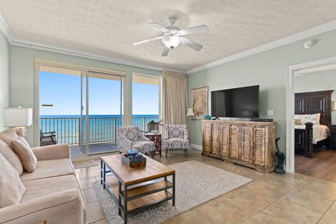 Relax in this coastal living room with ocean views and rustic wood accents.
