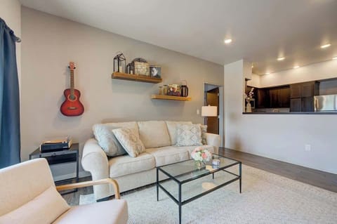 Livingroom includes a record player, guitar, classic records, and shuffleboard!