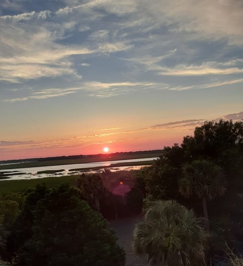 Sunset view from balcony in July.