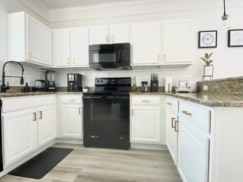 Fully stocked kitchen with modern appliances—perfect for whipping up meals during your stay.