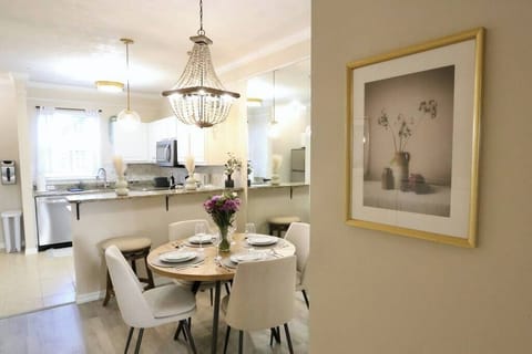 Elegant Open-Concept Dining & Kitchen Enjoy a bright, airy space perfect for morning coffee or an intimate dinner.