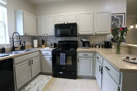 Enjoy the convenience of a fully equipped kitchen designed for both functionality and style. Whether you're whipping up a gourmet meal or just brewing your morning coffee, this space has everything you need.