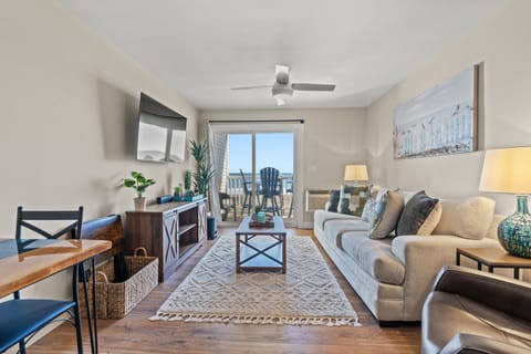 The ocean front living room is well-appointed with comfortable furnishings.