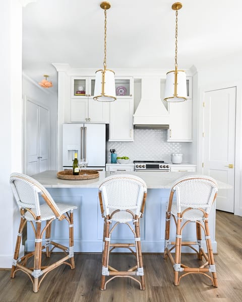 Kitchen has an eat at counter.