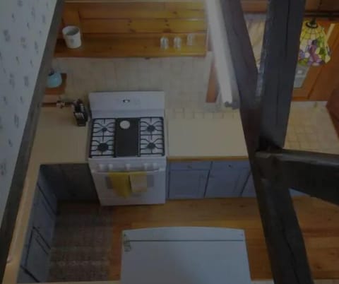 Kitchen view from landing at the top of the stairs