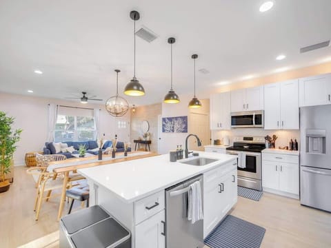 Birds Eye view from the kitchen into the living room - rest easy knowing you can keep an eye on the whole family from here