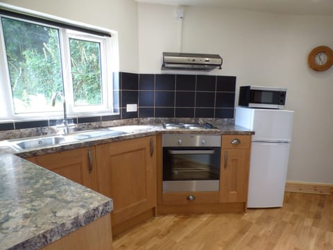 Fridge, electric kettle, toaster, cookware/dishes/utensils