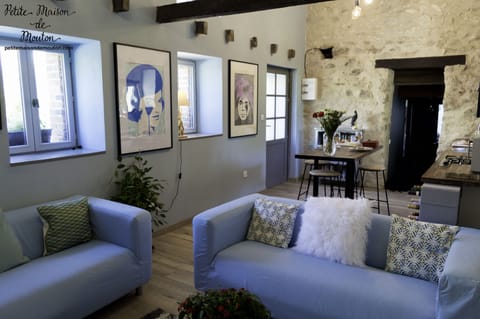 The super comfy sky blue sofas in the Petite Maison de Mouton. Art by Pure Evil.