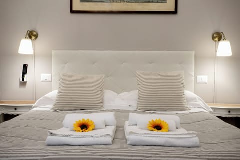 Standard Triple Room | Down comforters, in-room safe, desk, laptop workspace