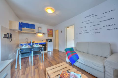 21-inch flat-screen TV with cable channels, TV