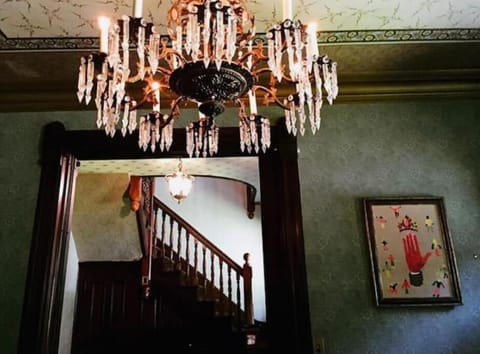 Original mahogany wood work and French Chandliers though out the house
