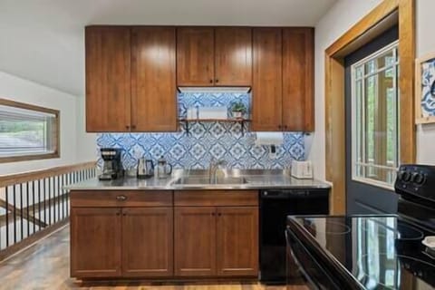 Drip coffee, kettle, French press and coffee grounds provided.