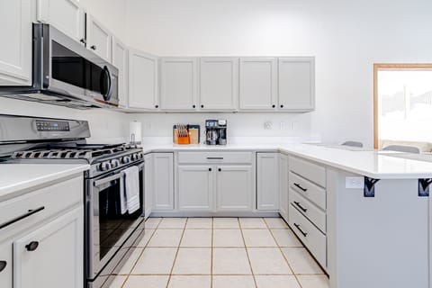 Large updated kitchen that has all the essentials including a started coffee and tea kit. Oil, salt and pepper for guests to use!