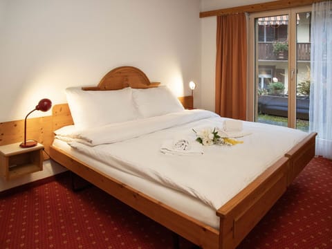 Bed, Furniture, Bedroom, Interior Design, Bed Sheet, Bedding, Flooring, Floor, Wood, Room