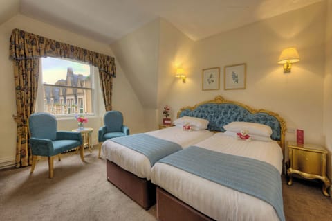 Twin Room, Garden View | In-room safe, desk, free WiFi, bed sheets