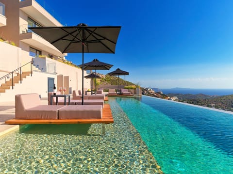 2 outdoor pools, pool umbrellas, sun loungers