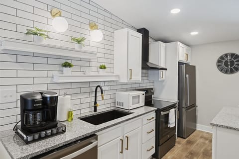 Modern kitchen equipped w/ top-of-the-line appliances