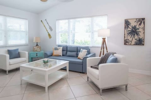 Enjoy movies in our welcoming living room with your crew on our 65" HD Smart TV. Spread out with our pullout sofa and Queen size air mattress.