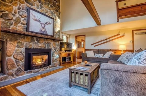 Rest and relax by the stone gas fireplace and watch a movie or catch a game. 