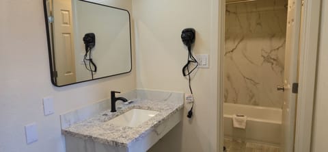 Standard Double Room, 2 Queen Beds | Bathroom | Free toiletries, hair dryer, towels, soap