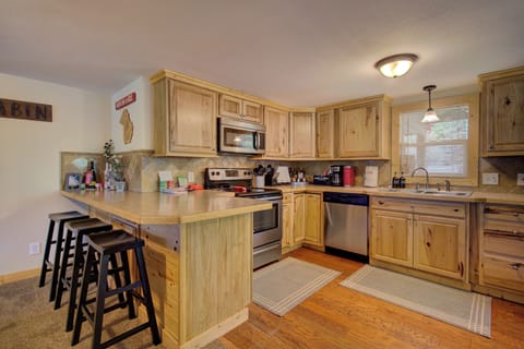 Full stocked kitchen with coffee station, bakeware, pots, pans & more.