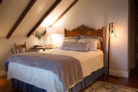 Bedroom upstairs with queen sized bed
