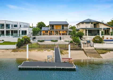 Private pontoon adds direct waterfront access near the pool and alfresco spaces.
