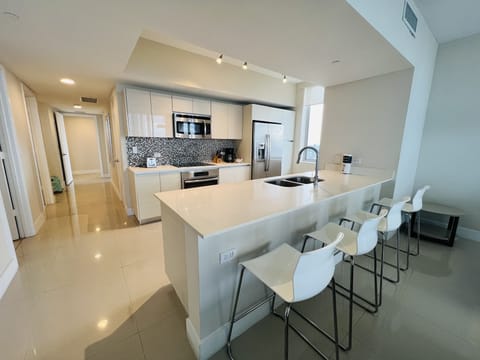 Deluxe Apartment, 3 Bedrooms, Canal View | Private kitchen | Microwave, espresso maker, cleaning supplies