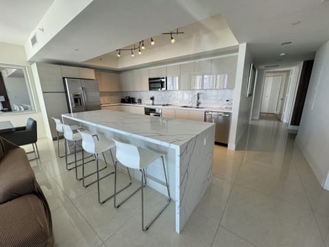 Elite Apartment, 3 Bedrooms, Ocean View | Private kitchen | Microwave, espresso maker, cleaning supplies