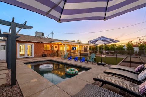 Enjoy our lovely backyard complete with pool, games, and more
