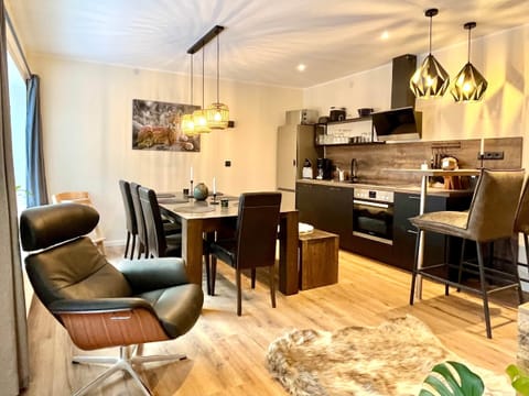 Living room with modern kitchen