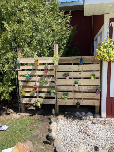 Mini vertical herb garden for guests to get fresh herbs!