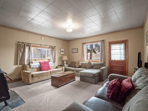 【Living Room】Three couches and room for the whole gang to land after the trail