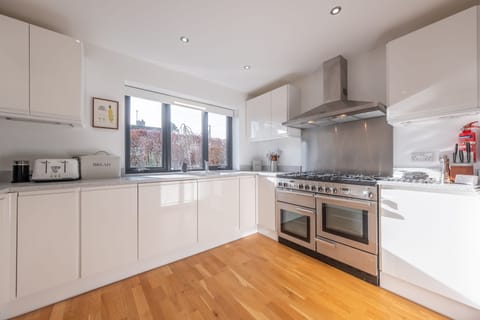 Ground floor: Kitchen with a Rangemaster double oven, microwave, dishwasher, fridge-freezer and Nespresso coffee machine