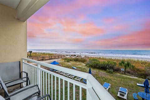 Oceanview Balcony: Sip coffee while soaking in stunning sunrise colors over the ocean!