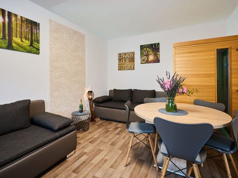 Furniture, Table, Picture Frame, Property, Couch, Green, Interior Design, Plant, Houseplant, Comfort