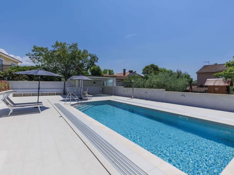 Water, Sky, Plant, Swimming Pool, Azure, Building, Shade, Rectangle, Tree, Composite Material