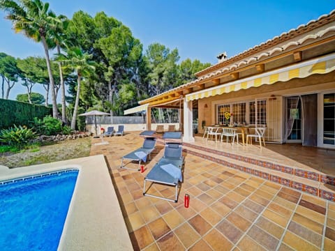 Plant, Sky, Property, Water, Building, Tree, Swimming Pool, Shade, Outdoor Furniture, Architecture