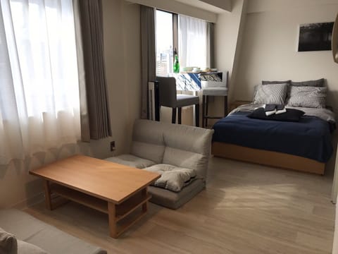 Family Studio | Living area | 30-inch LED TV with cable channels, TV