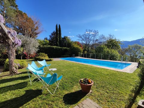 Plant, Sky, Water, Azure, Tree, Natural Landscape, Swimming Pool, Outdoor Furniture, Vegetation, Building