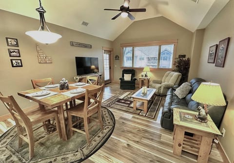 Large open living & dining area with vaulted ceiling