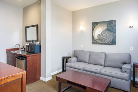 Lopez Suite | Living area | Flat-screen TV