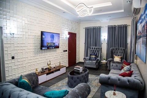 Luxury Apartment | Living area | 55-inch Smart TV with digital channels, TV, Netflix